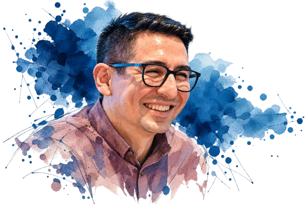 Retrato de Carlos Girón en acuarela: sonríe, con gafas y camisa granate, entre manchas y salpicaduras azules.